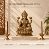 Two thick 24 mm Shubh Deepavali dhoop sticks for Lakshmi puja beside a brass Lakshmi idol